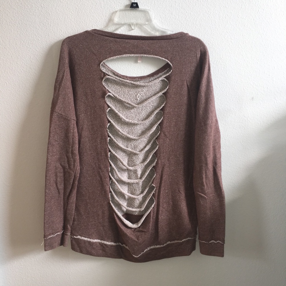 Brown sweatshirt with cut open back